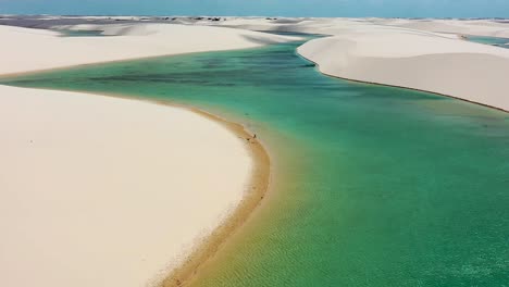 Paradisiac-waves-scenery-of-rainwater-lakes-and-sand-dunes-of-Lencois-Maranhenses-National-Park-Brazil