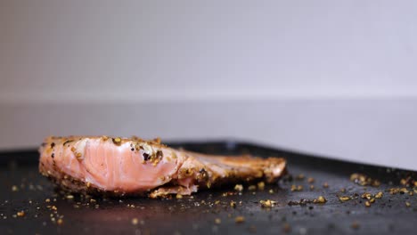 Fresh-Seasoned-Salmon-Flipped-on-an-Indoor-Cooking-Grill,-Lockdown-Close-up