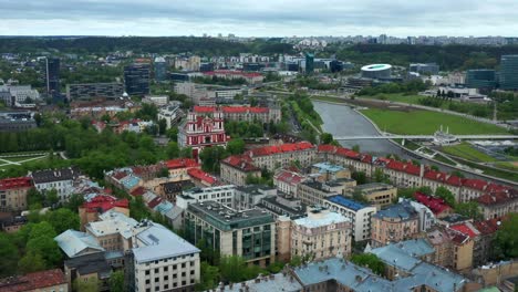 Aerial-View-Of-Vilnius-City-With-River-In-Lithuania---drone-shot
