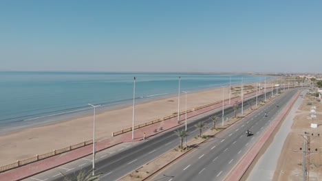 Aerial-Parallax-Over-Marine-Drive-Beside-Beach-Coastline-In-Gwadar