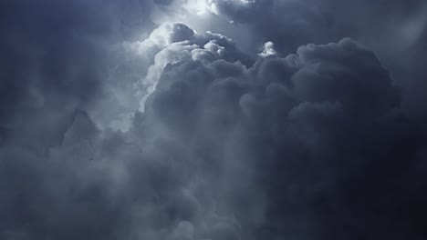 thunderstorm,-a-ray-of-light-inside-a-dark-gray-cloud-in-the-sky-that-moves-4K