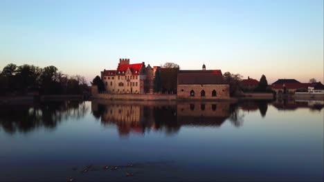 Drone-shot-of-Moated-water-castle-Wasserburg-in-Flechtingen,-Germany