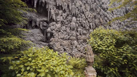 Unique-Garden-Landscape-With-Green-Foliage-And-Earthen-Wall---Medium-Shot