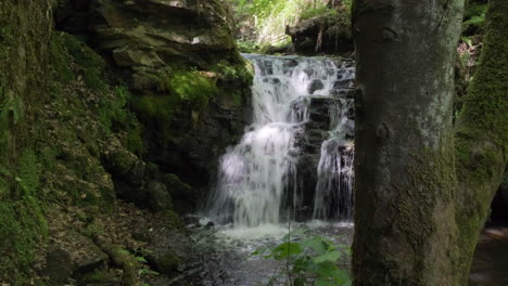 Waterfall-in-a-wood-in-Yorkshire,-Gorpley-Clough-woods
