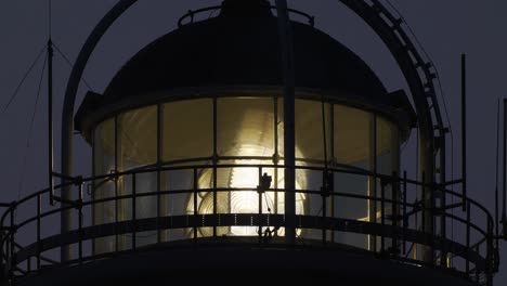 View-Of-Bevelled-Fresnel-Lens-Spinning-At-Lighthouse-In-The-Evening