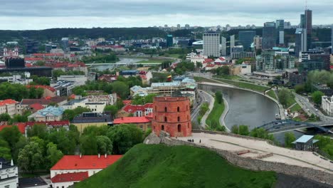Gediminas-Castle-Tower,-Neris-River,-And-Vilnius-Business-District-In-Lithuania