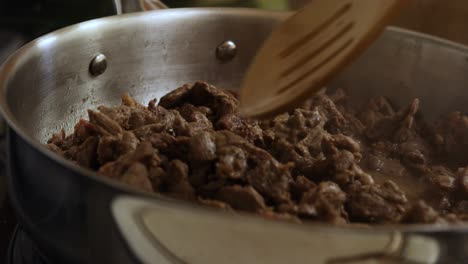 Homemade-beef-carne-flavoured-taco-meat-cooking-in-frying-pan,-closeup