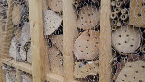 A-man-made-insect-hotel-offering-a-house-for-bugs-and-insects-in-the-nature