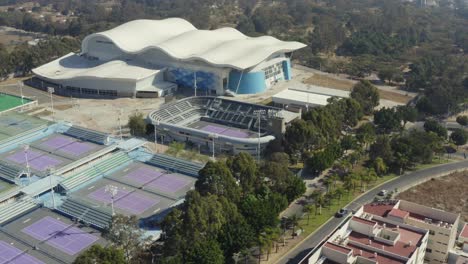 Drone-shot-of-the-Aquatic-Center-and-the-Pan-American-Tennis-Center-in-the-CODE-Metropolitano-of-Guadalajara-Zapopan,-Jalisco,-Mexico