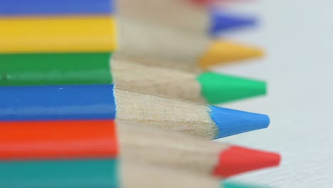 Macro-Shot-Of-Multicolored-Pencils-On-White-Background