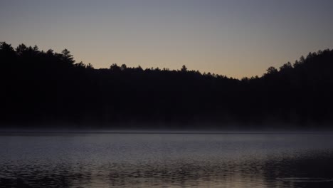 Reflections-On-Lake-Opeongo-At-Sunrise,-Algonquin-Provincial-Park