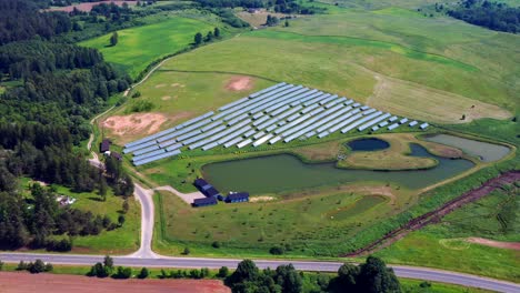 Aerial-View-Of-Solar-Power-Plant-Near-Trakai,-Lithuania---drone-shot