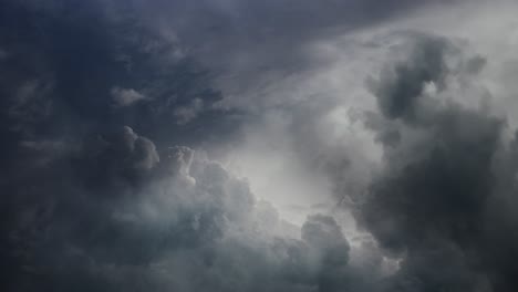 POV-lightning-flashes-in-cumulonimbus-clouds,-thunderstorm-4K