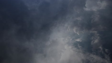 POV-cumulonimbus-clouds-and-lightning-flashes,-thunderstorm