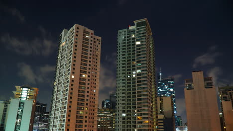Scenic-View-Of-Makati-City-Skyline-On-A-Cloudy-Night---timelapse