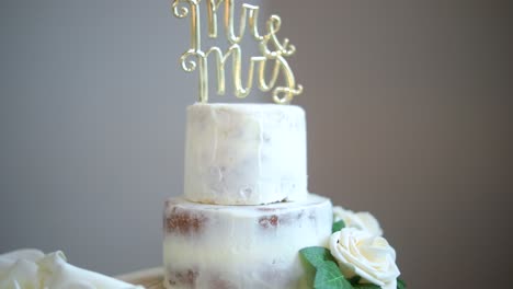 Wedding-Cake-with-Romantic-Decorations-and-White-Frosting,-Dolly-Out