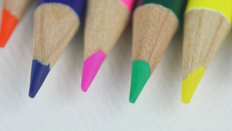 Macro-Of-Sharpened-Colored-Pencils-On-White-Background