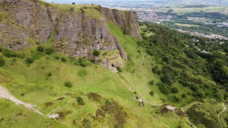 Aerial-view-of-lower-cave-at-Cavehill,-overlooking-Belfast-City,-Northern-Ireland