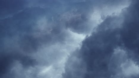 flying-through-dark--clouds,-thunderstorm