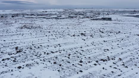 Rural-town-Njarðvík-during-winter-in-Iceland,-aerial
