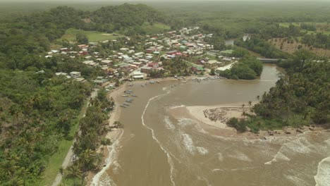 Aerial-drone-view-of-the-Atlantic-ocean-meet-the-Ortoire-River-on-the-south-eastern-coast-of-Trinidad