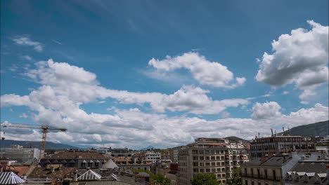 Time-Lapse-taken-over-the-building-rooftops-of-downtown-Geneva,-Switzerland