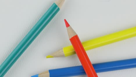 Overhead-Shot-Of-Colored-Pencils-Isolated-On-White---close-up