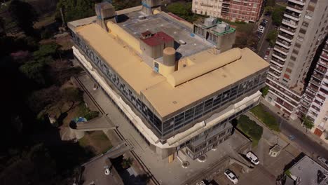 Aerial-drone-orbiting-over-roof-of-National-Library-in-Buenos-Aires-City,-Argentina