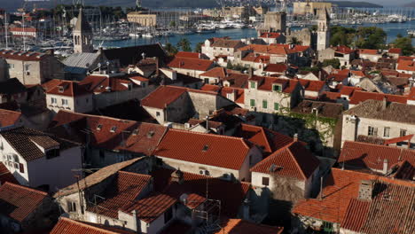 Aerial-View-On-Red-Rooftops-At-Croatian-Town-Trogir---drone-shot