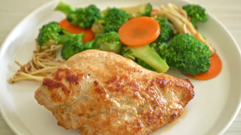 grilled-chicken-steak-with-vegetable-on-white-plate