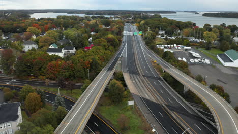 Gorgeous-drone-shot-of-the-I-295-highway-running-through-Portland,-Maine