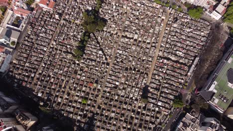 Aerila-top-down-of-large-Recoleta-Cemetery-in-Buenos-Aires-City-during-sunny-day---High-angle-drone-flight