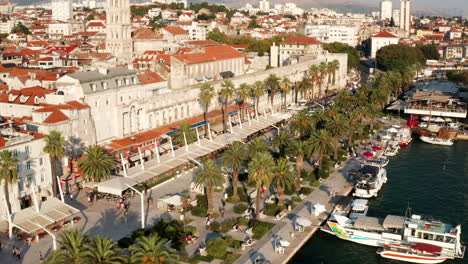 Aerial-View-Of-Tourists-At-Riva,-Bustling-Waterfront-With-Expansive-Boardwalk-And-Numerous-Eateries-In-Split,-Croatia