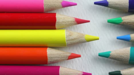 Variety-Of-Colored-Pencils-On-White-Surface