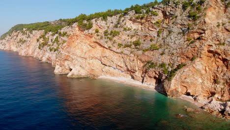 Idyllic-secluded-Croatia-coastline,-rugged-cliffs-on-Adriatic-Sea,-aerial-view