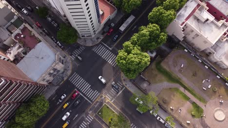 Aerial-top-down-rising-directly-above-car-traffic-and-road-junction-in-Buenos-Aires-downtown