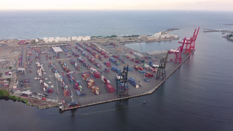 A-drone-circle-orbits-around-port-Haina-early-in-the-morning-before-opening-hours-as-the-cranes-are-still-aerial