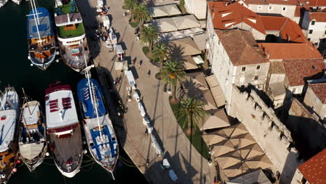Boats-Docked-At-The-Marina-In-Historic-Town-Of-Trogir-On-Adriatic-Coast-In-Split-Dalmatia-County,-Croatia