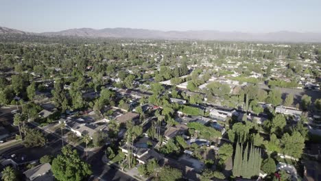 Residential-neighborhood-of-houses,-aerial-view-on-hazy-day-in-San-Fernando-Valley