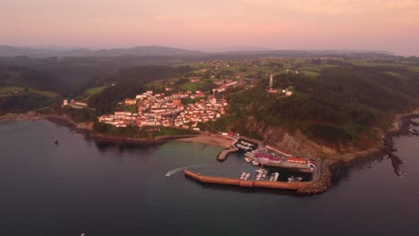 Drone-view-of-lastres-small-village-on-the-cliff-north-Spain-traditional-coastline-in-the-region-of-Asturias