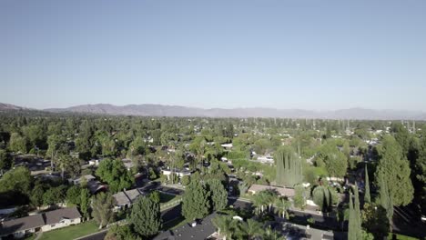 Northridge-residential-neighbourhood-homes-aerial-view-rising-above-trees-San-Fernando-Valley-suburb