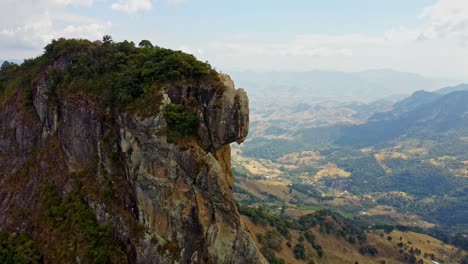 Aerial-pull-out-reveal-of-Pedra-Do-Bau-rock-formation-in-The-Mantiqueira-Mosaic,-one-of-Brazils-National-Natural-Parks