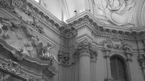 Low-angle-Black-and-white-shot-of-beautiful-interiors-of-Sanctuary-of-Santa-Maria-della-Vita-in-Bologna,-Italy-at-daytime