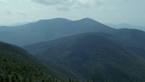 A-hazy-mountain-range-panning-shot-shows-the-white-mountain-range-of-New-Hampshire
