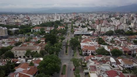 Paseo-General-Martin-Miguel-de-Guemes-aerial-above-large-black-cross-structure-on-road-avenue-below