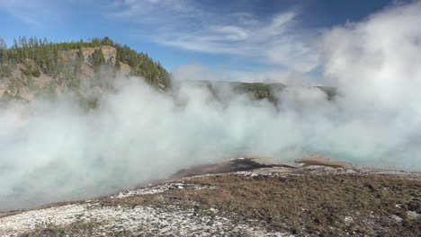 Steam-Above-Hydrothermal-Hot-Springs-in-Yellowstone-National-Park,-Wyoming-USA