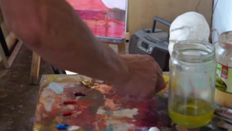 Atelier-Painting-Artist,-Red-Color-Hand-Slow-Motion