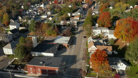 Gorgeous-drone-flyover-of-Lisbon-Falls'-downtown,-Maine