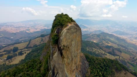 Pedro-do-Bau-rock-formation,-aerial-pull-out-shot-with-parallax-effect,-Located-in-The-Mantiqueira-Mosaic-one-of-Brazils-national-parks