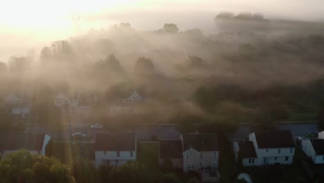 Aerial-of-residential-homes-at-dawn,-daybreak